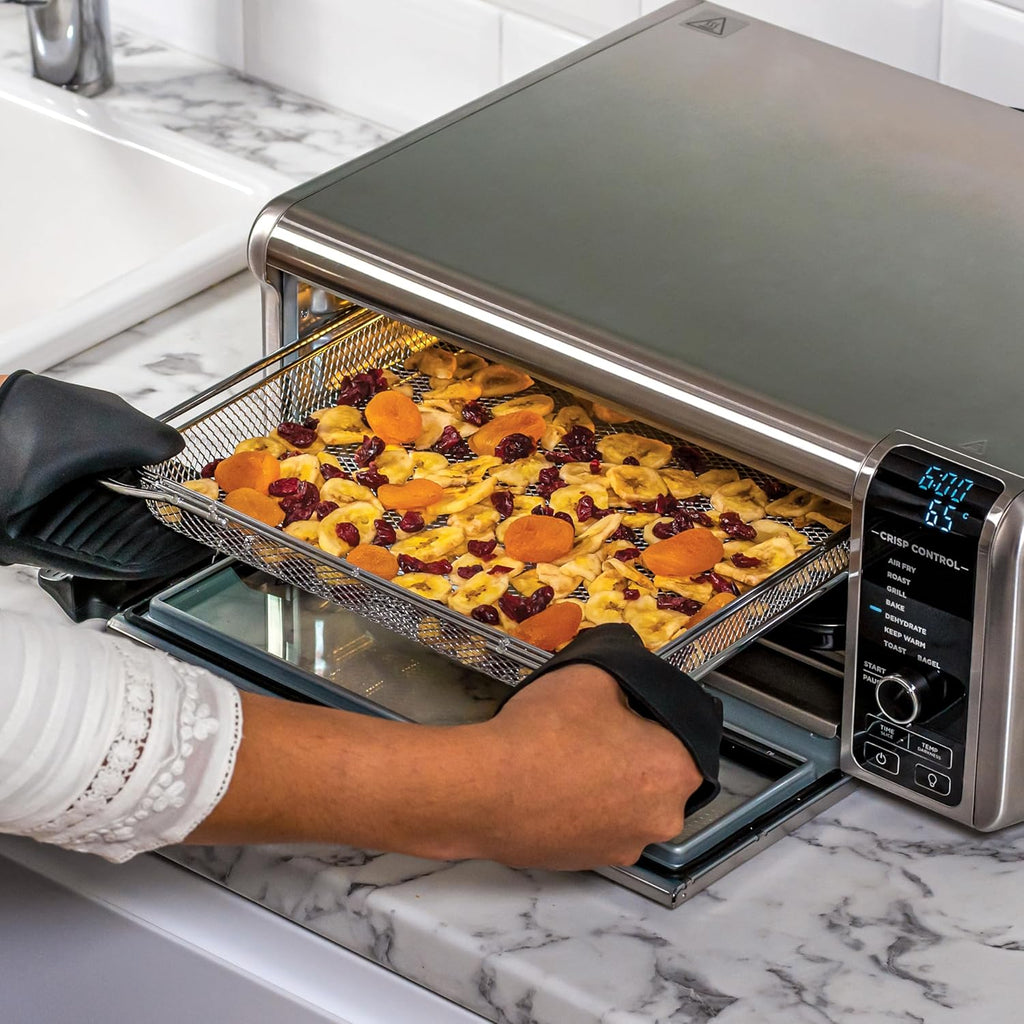 Ninja Foodi Four Multifonctions 8-en-1, Mini four portable, surfaces de travail, four multifonctions avec 8 fonctions de cuisson ; Air Fry, Rôtir, Griller, Cuire et plus encore. Argent/Noir SP101EU